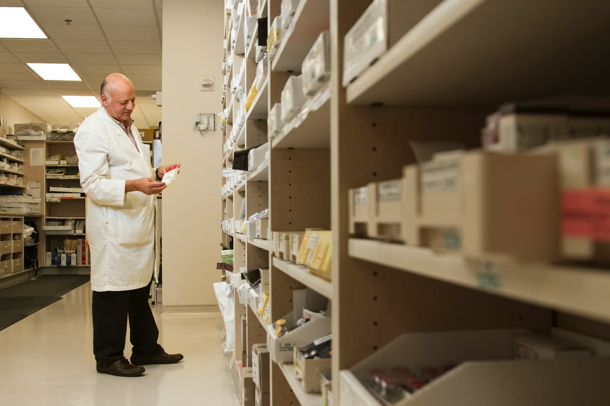 Pharmaceutical sales representatives collaborating in a modern office environment